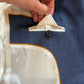 Blazer strutturato in pura lana con dettaglio del piercing sul retro