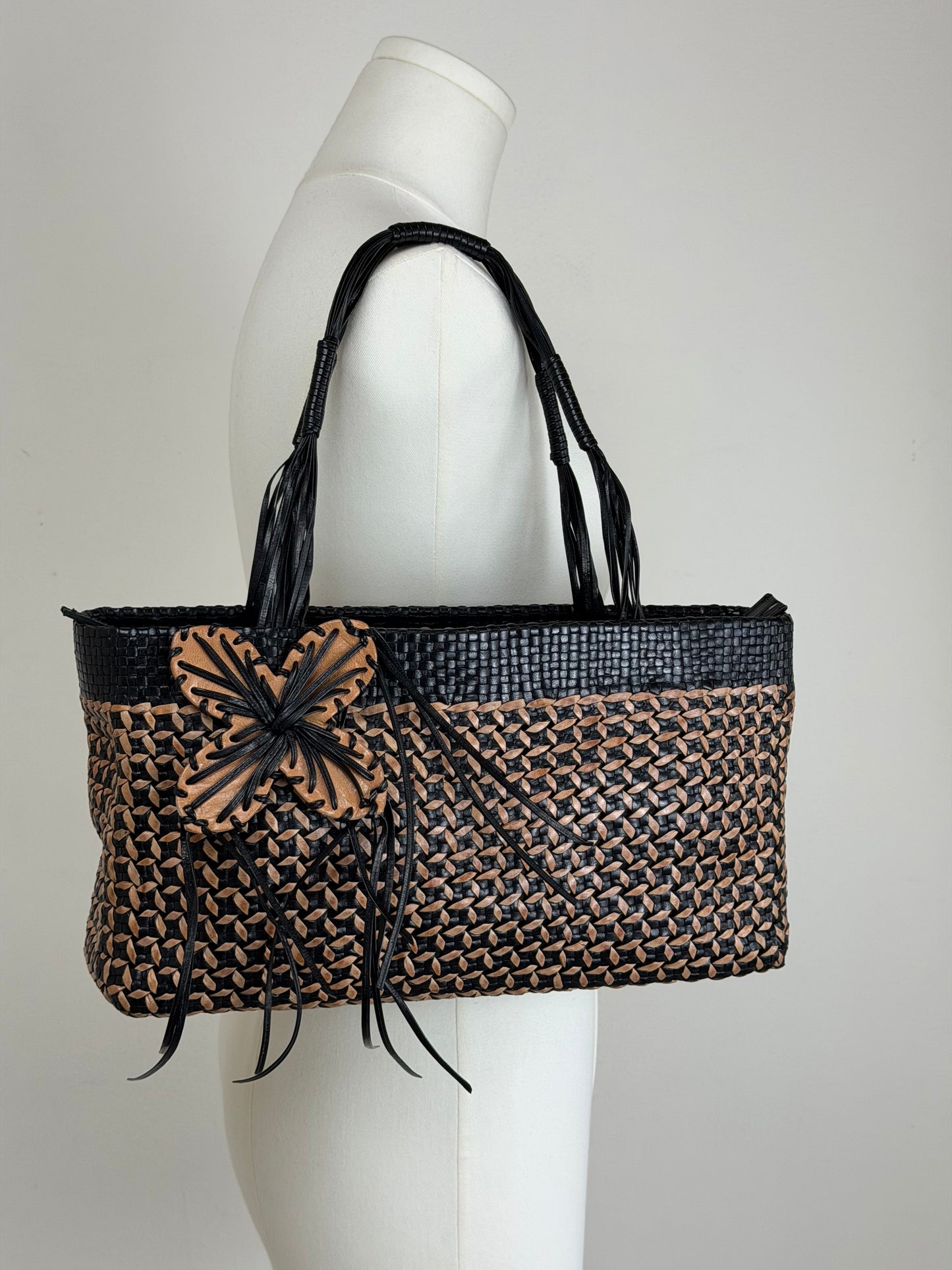 Borsa vintage in vera pelle intrecciata