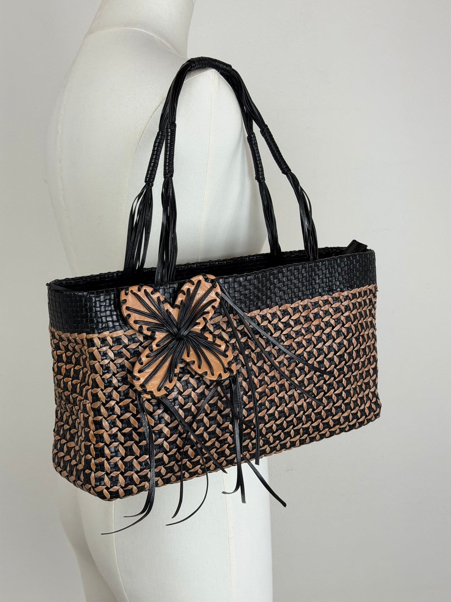 Borsa vintage in vera pelle intrecciata