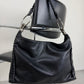 Borsa in vera palle con anelli metallici