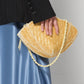 Borsa a conchiglia in paglia intrecciata