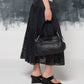 Shoulder bag in vera pelle con anelli